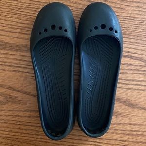 Black Crocs Flats